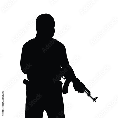 Terrorist and rifle gun in hand silhouette vector