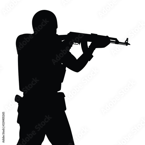 Terrorist and rifle gun in hand silhouette vector
