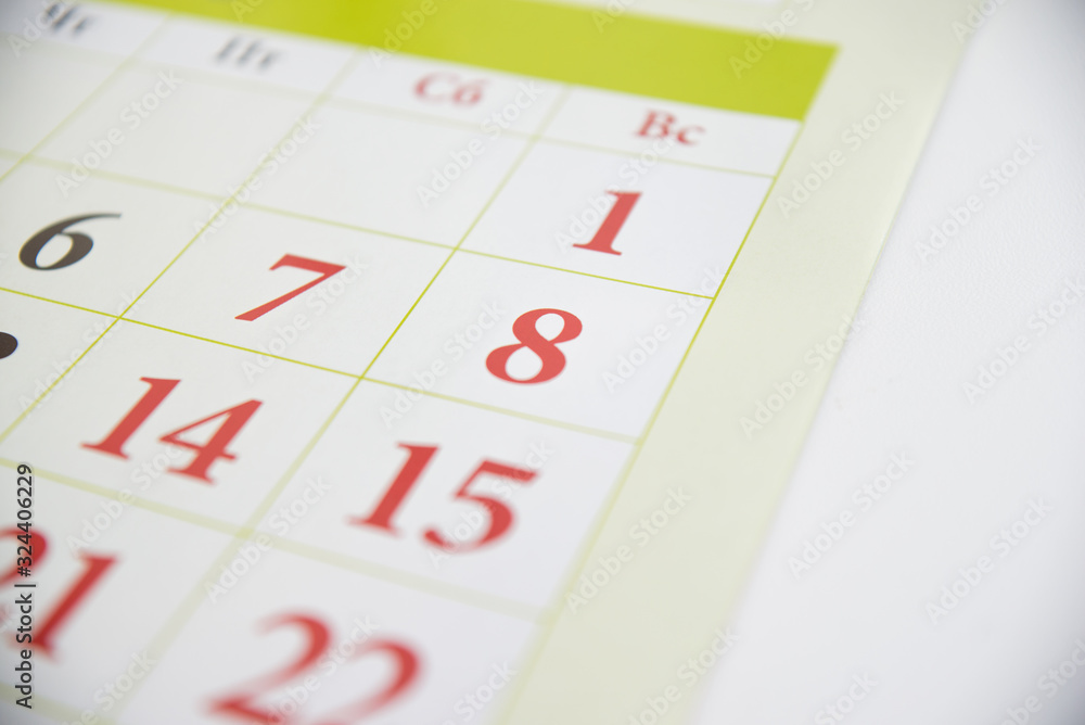 Green calendar with holidays. Close up Green calendar with holidays. Close up