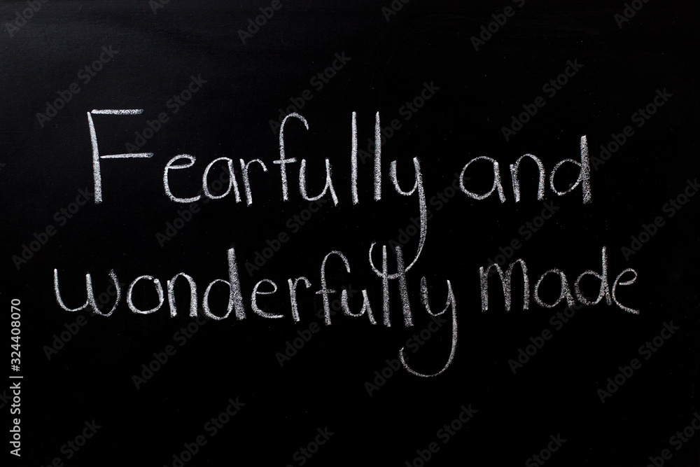 Fearfully and Wonderfully made written in chalk on a chalkboard Fearfully and Wonderfully made written in chalk on a chalkboard