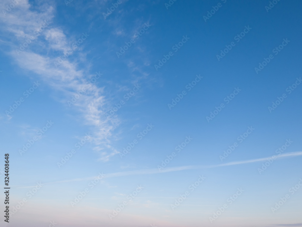 Fototapeta premium Light cirrus clouds in the blue sky