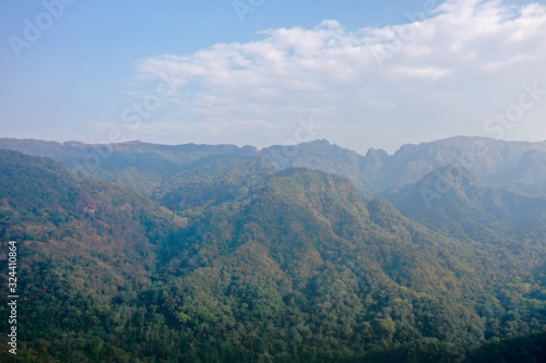 High angle scenic view of mountain against foggy sky  © pong