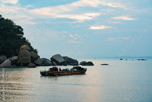 Sunset blues hour shantou city coastal scenery photo