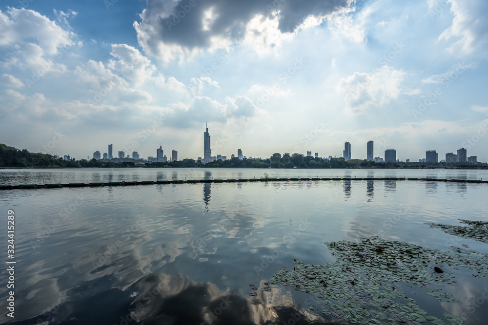 Naklejka premium modern nanjing city skyline with the beautiful lake
