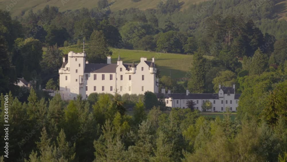 Wide sunny day panoramic still shot of Athol Estate pines forest surrounding the Blair Castle, Scotland, Wide sunny day panoramic still shot of Athol Estate pines forest surrounding the Blair Castle, Scotland,