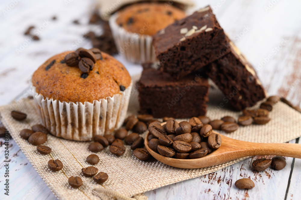 Banana cupcakes mixed with chocolate chip on a white plate. Banana cupcakes mixed with chocolate chip on a white plate.