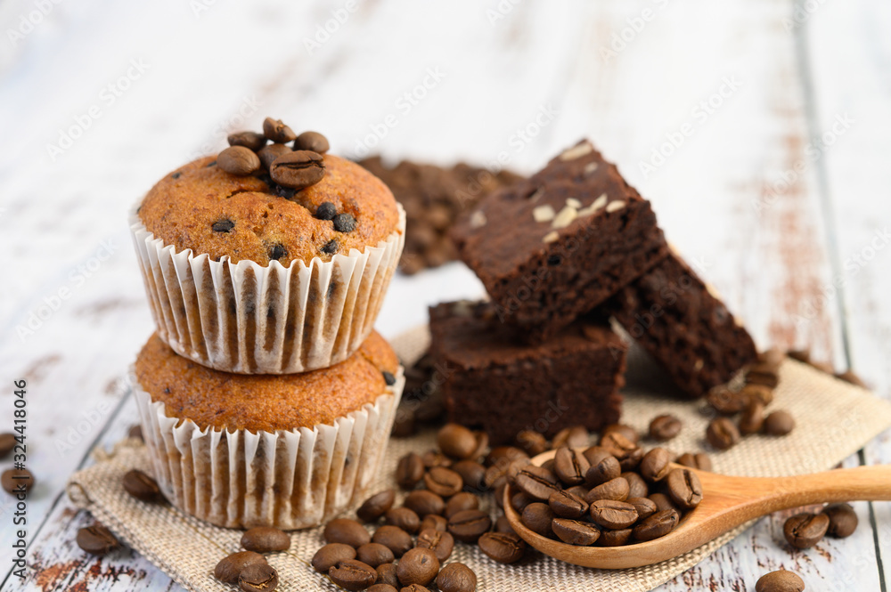 Banana cupcakes mixed with chocolate chip on a white plate. Banana cupcakes mixed with chocolate chip on a white plate.