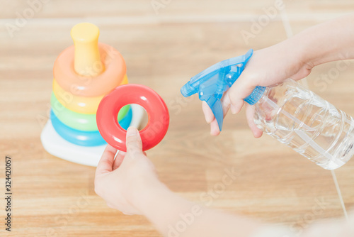 Asian women disinfect baby toys