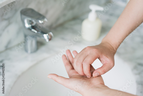Hand features of Asian women washing their hands