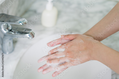 Hand features of Asian women washing their hands