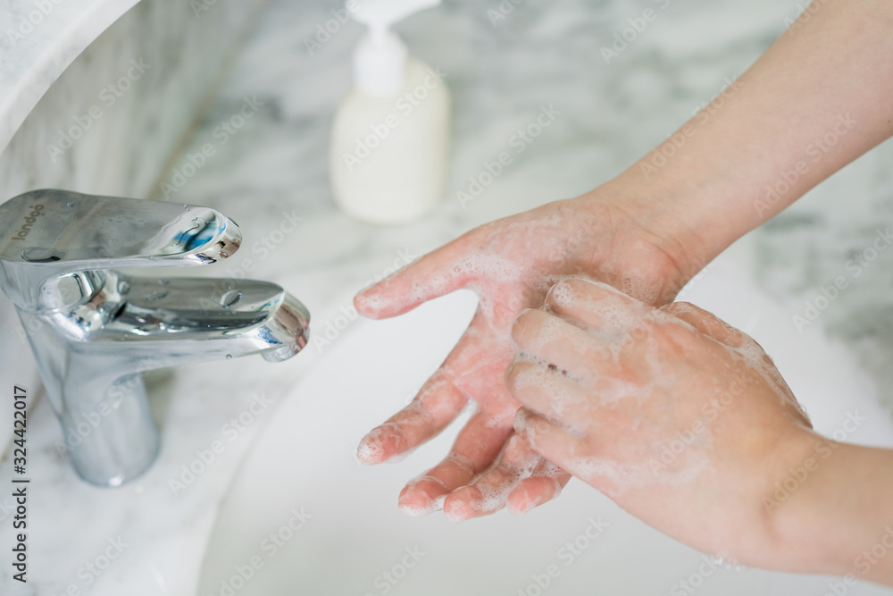 Hand features of Asian women washing their hands Hand features of Asian women washing their hands