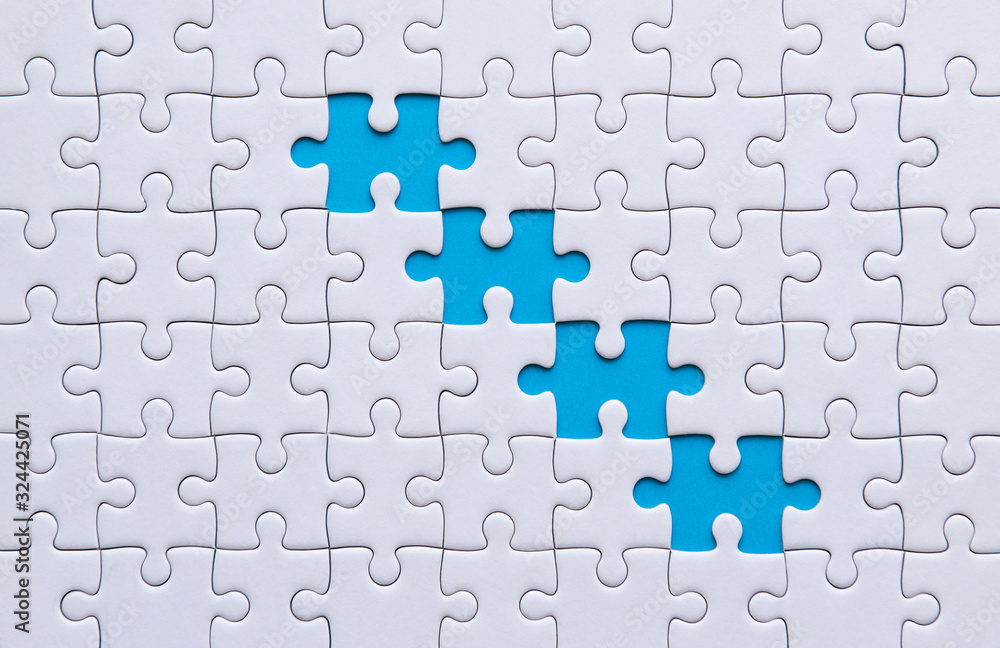 Jigsaw puzzle white color,Puzzles pieces grid,Success mosaic solution template,Horizontal on blue color background copy space for text,Top view Jigsaw puzzle white color,Puzzles pieces grid,Success mosaic solution template,Horizontal on blue color background copy space for text,Top view