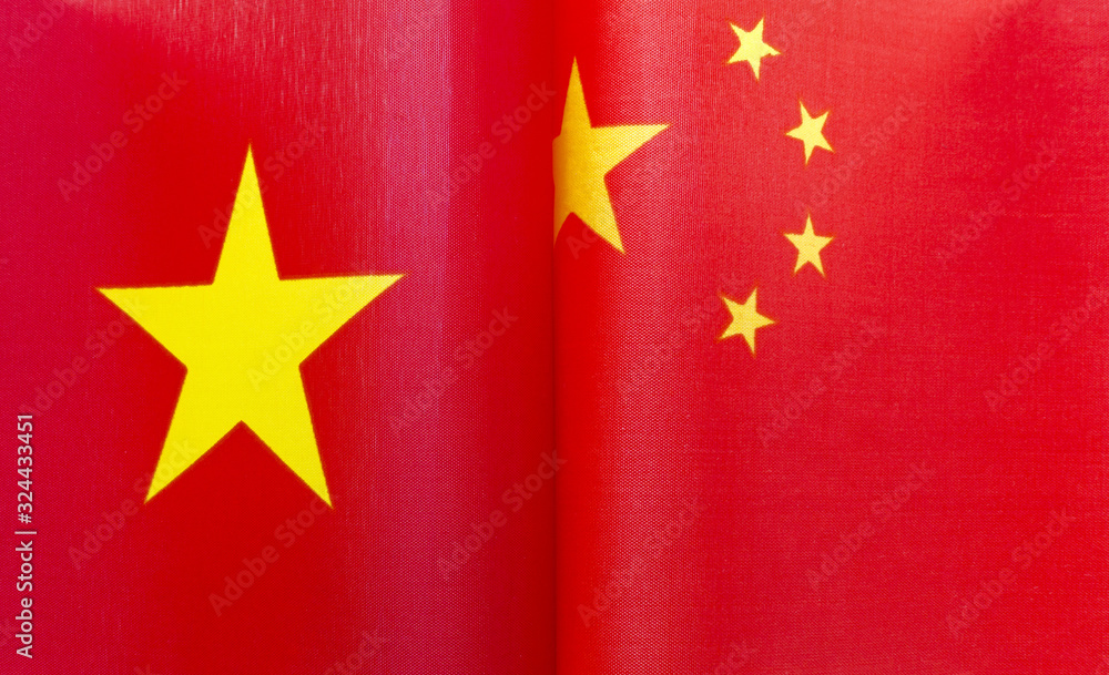 fragments of national flags of the socialist Republic of Vietnam and China close up fragments of national flags of the socialist Republic of Vietnam and China close up