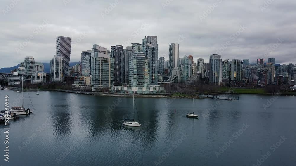 Vancouver downtown and moored yachts at False creek Vancouver downtown and moored yachts at False creek