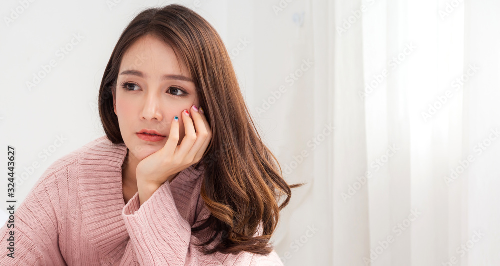 Portrait of smilling happy beautiful asia woman enjoy and relax posing in the room at home.asian beauty Portrait of smilling happy beautiful asia woman enjoy and relax posing in the room at home.asian beauty