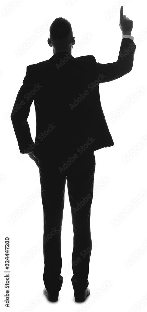 Silhouette of businessman pointing at something on white background. Concept of choice