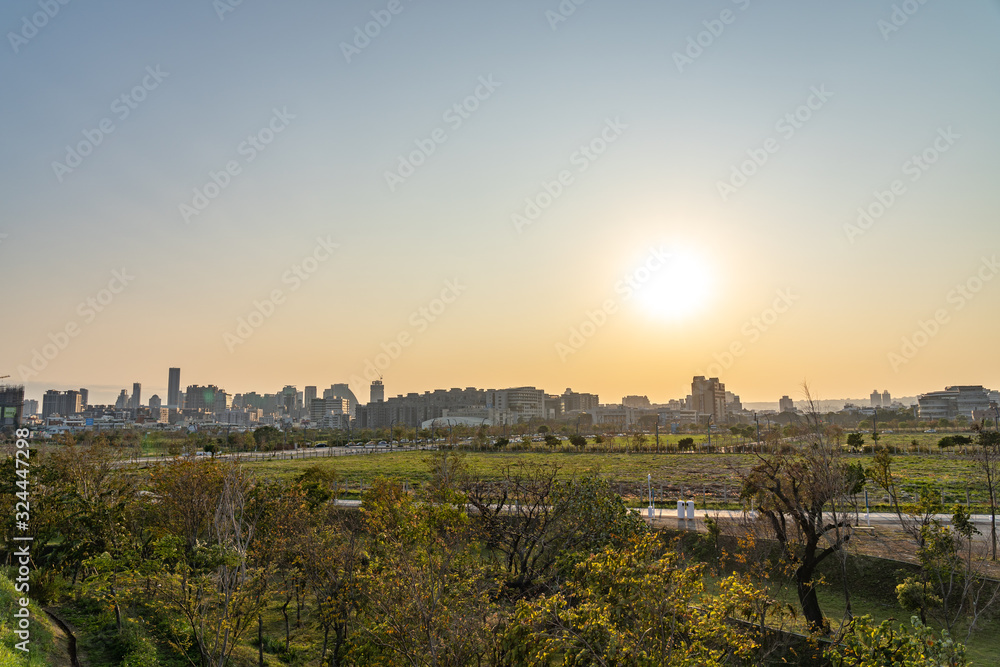 Fototapeta premium Taichung Central Park at the Shuinan Economic and Trade Area in blue sky sunny day. Former Shuinan Airport, lot of green space in here, the second largest park in Taiwan. Xitun District, Taichung City