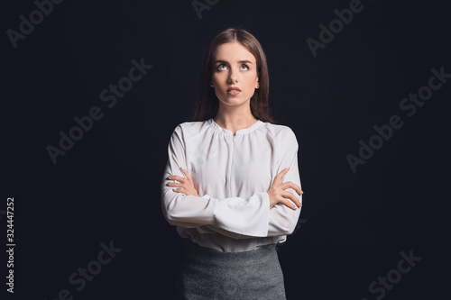 Thoughtful businesswoman on...