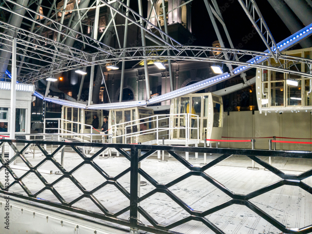 Image of entrance on the ferris wheel at night