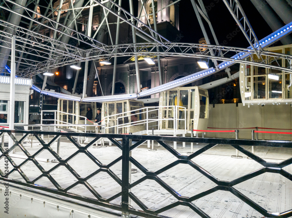 Image of entrance on the ferris wheel at night Image of entrance on the ferris wheel at night