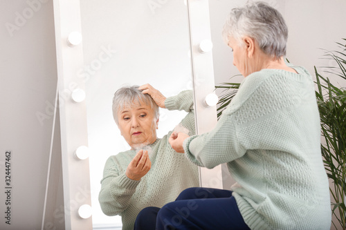 Senior woman with hair loss...