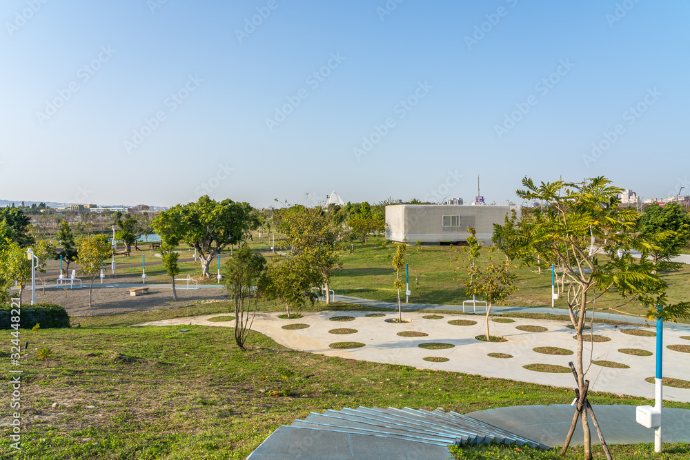 Fototapeta premium Taichung Central Park at the Shuinan Economic and Trade Area in blue sky sunny day. Former Shuinan Airport, lot of green space in here, the second largest park in Taiwan. Xitun District, Taichung City