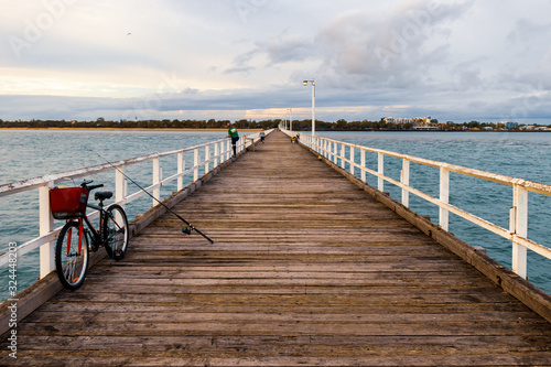 Bike and fishing rod on Pier