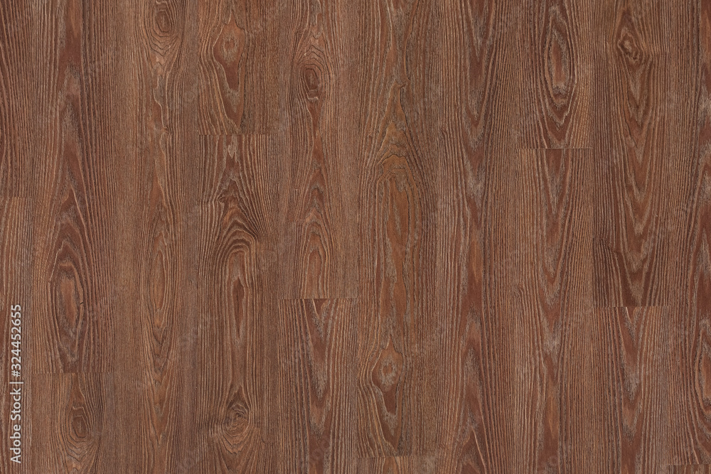 Naklejka premium Natural dark brown wooden surface floor texture background. polished laminate parquet