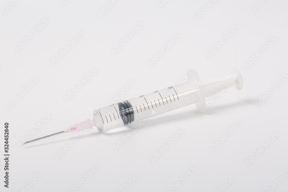 Macro closeup of syringe on white background Macro closeup of syringe on white background
