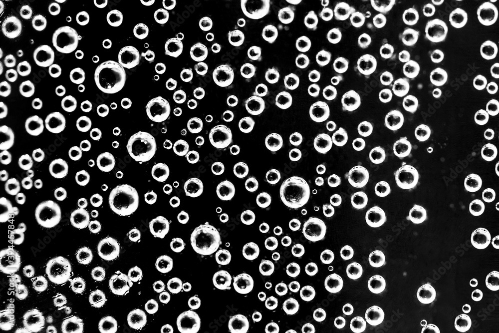 Air balls in water on a black background Air balls in water on a black background