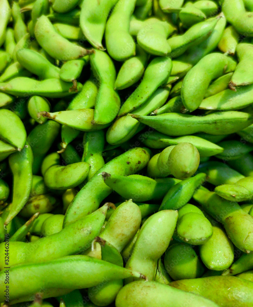 Green beans on the market as a background Green beans on the market as a background