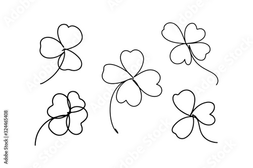 Continuous line art, hand drawn shamrock set.