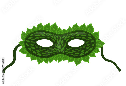 Carnival mask with leaves isolated on a white background. Vector graphics.
