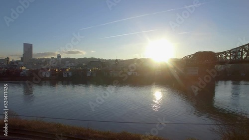 Portland CIty Skyline reveals Broadway Bridge and Downtown Busy Area at Sunset photo