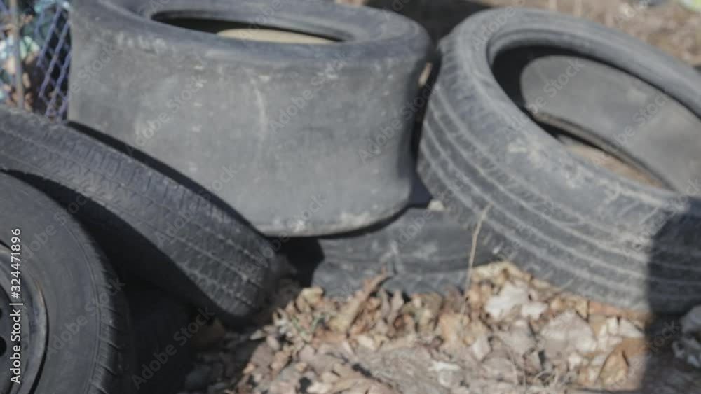 Used tire stacks in Workshop vulcanization yard - Close Up Shot Used tire stacks in Workshop vulcanization yard - Close Up Shot