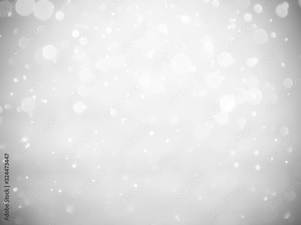 silver and white bokeh lights defocused. abstract background silver and white bokeh lights defocused. abstract background