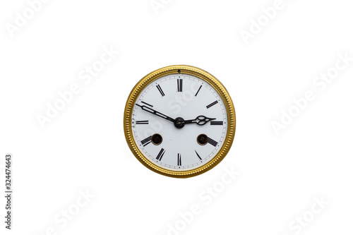 Old vintage decorated analog clock face 
