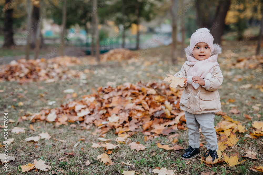 A little girl smile and on the grass A little girl smile and on the grass