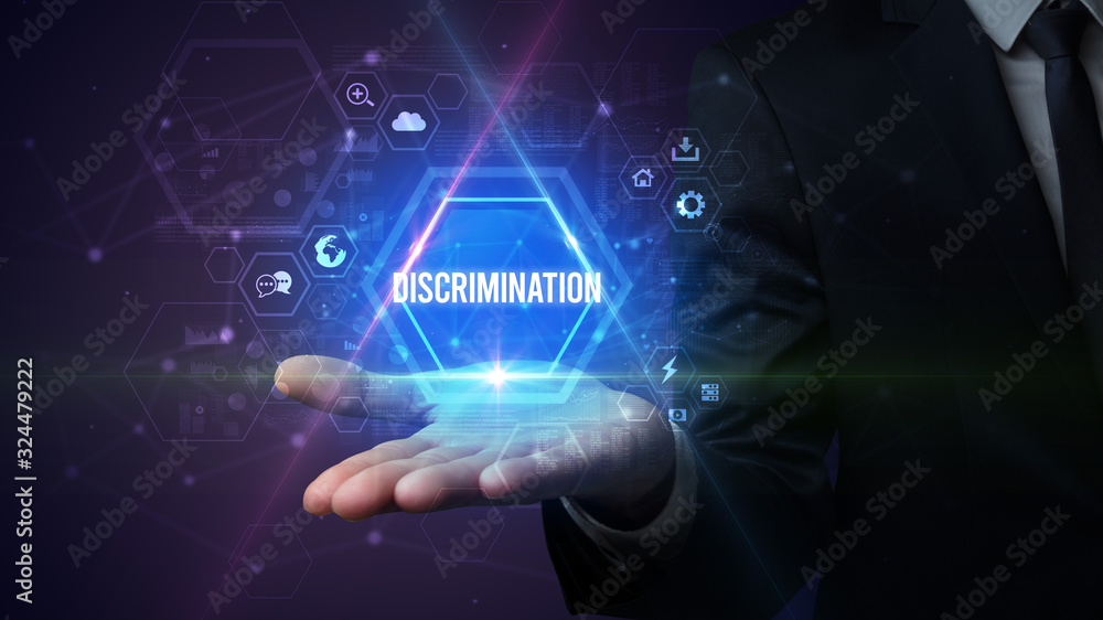 Man hand holding DISCRIMINATION inscription, social media concept Man hand holding DISCRIMINATION inscription, social media concept