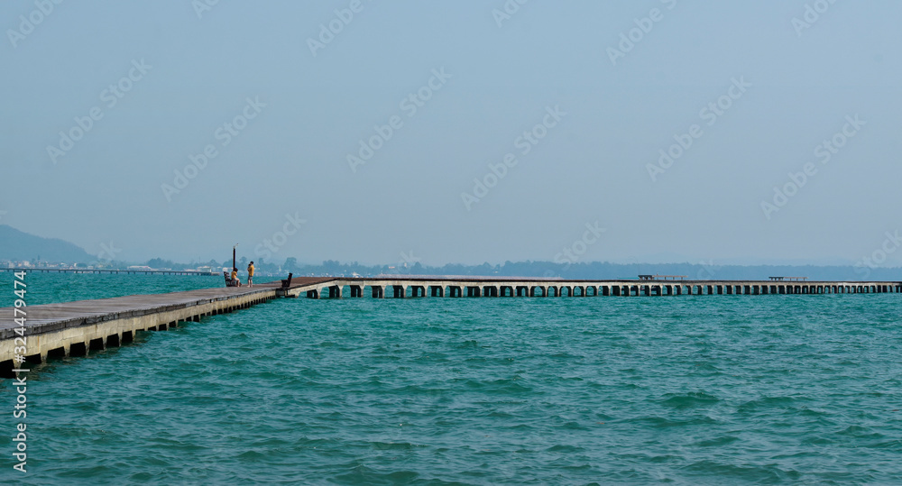Long walking bridge Into the beautiful sea And beautiful sea water Long walking bridge Into the beautiful sea And beautiful sea water