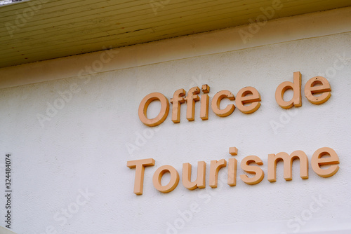 office de tourisme French tourism office sign on wall building tourist help