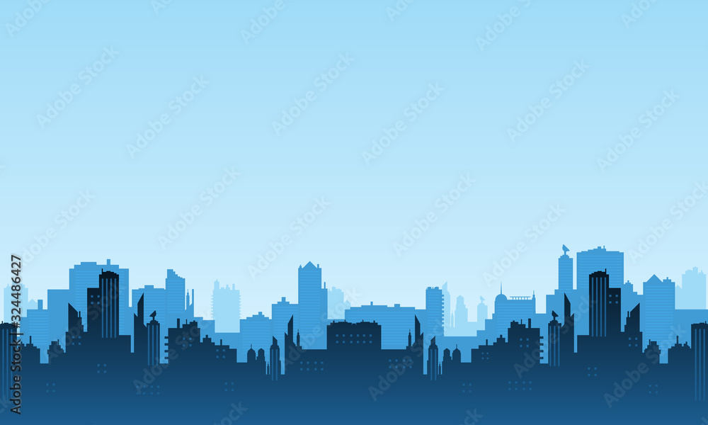 Silhouette of a city in the morning with a bright blue sky.