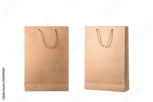 New blank brown paper bag for shopping. Studio shot isolated on white