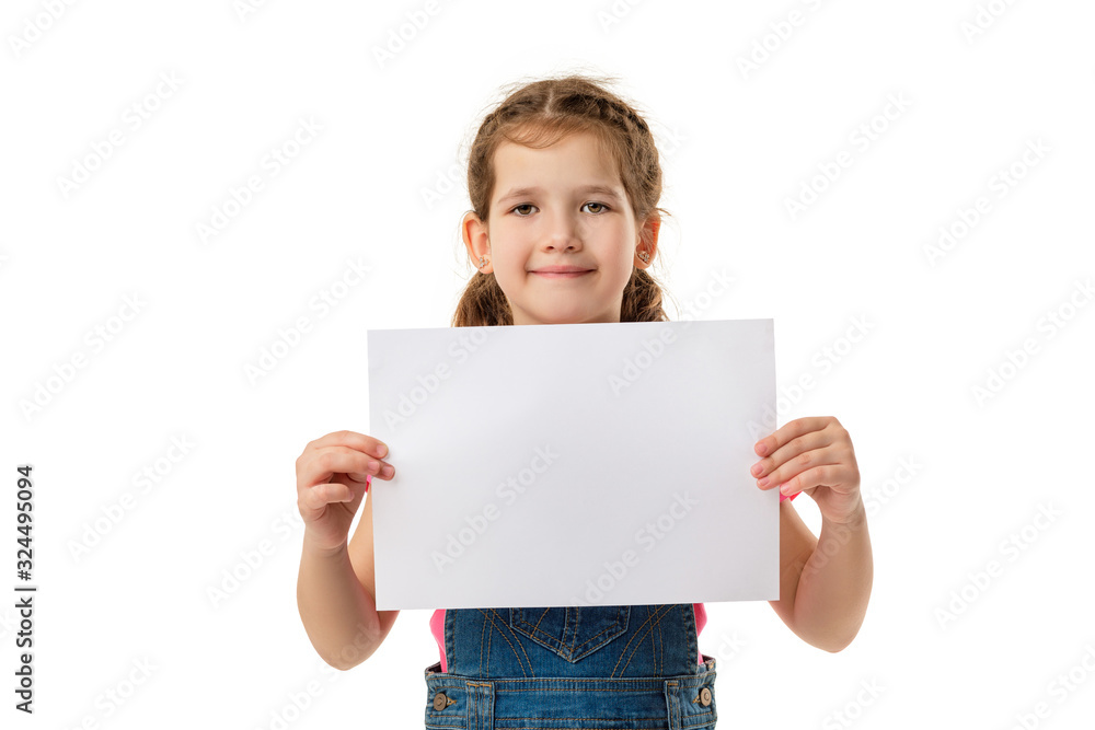 Happy cute child holding empty blank isolated on white background. kid with placard board for your text. girl with white sheet of paper. copy space Happy cute child holding empty blank isolated on white background. kid with placard board for your text. girl with white sheet of paper. copy space