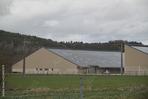 Solar panels installation on a farm roof