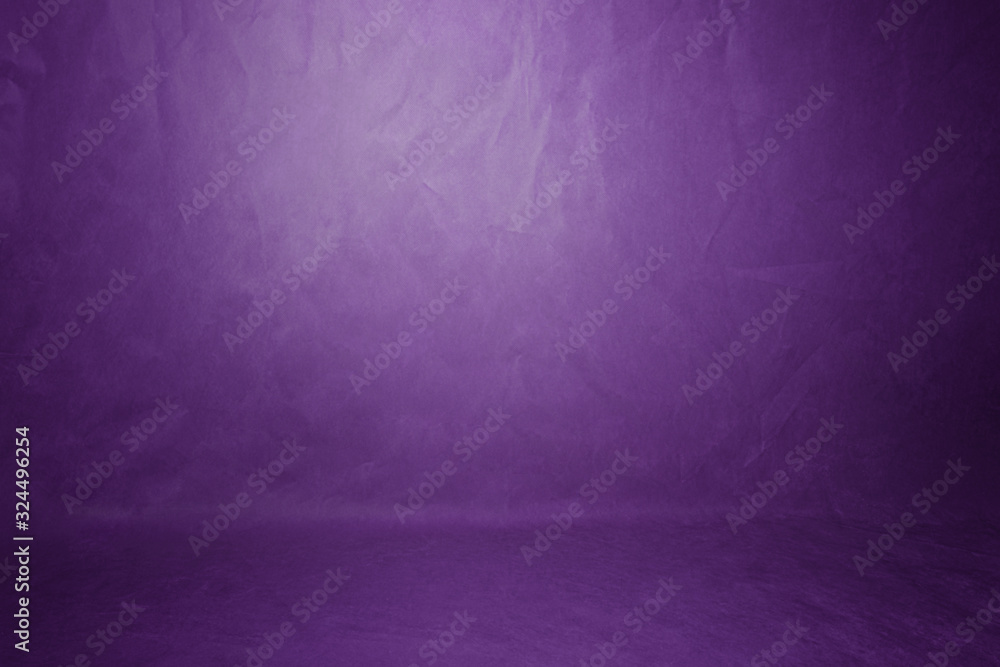 Studio background, backdrop wall and floor. Background Studio Portrait Backdrops painted canvas or fabric for use with portraits, products and concepts. Light spot on a purple fabric background. Studio background, backdrop wall and floor. Background Studio Portrait Backdrops painted canvas or fabric for use with portraits, products and concepts. Light spot on a purple fabric background.