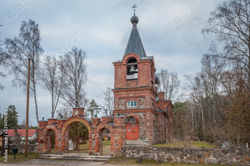 Road comes from gates to Varska orthodox church. Estonia. photo