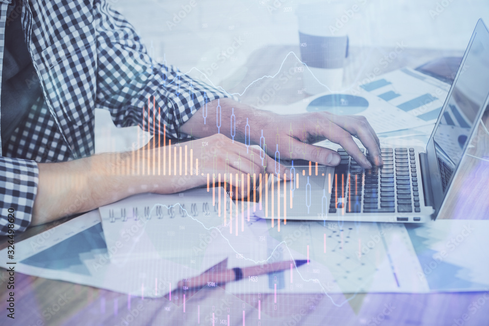 Multi exposure of stock market chart with man working on computer on background. Concept of financial analysis.