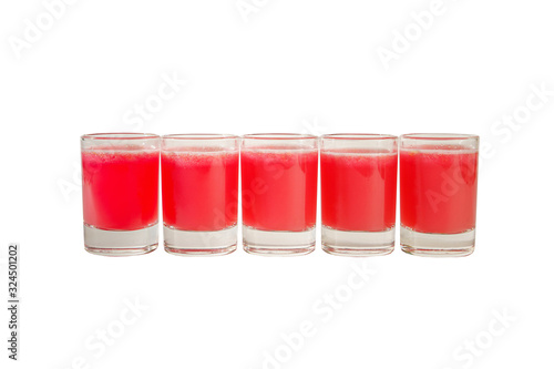 Red, same color transparent cocktails, a set of shots in one row, five servings. Side view Isolated white background. Drink for the menu restaurant, bar, cafe photo