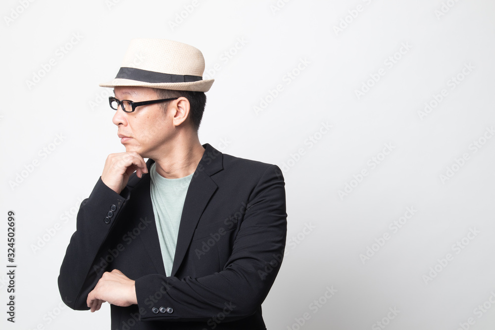 Serious adult asian man look away. Serious adult asian man look away.